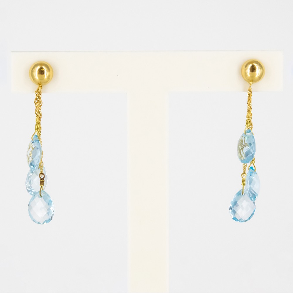 Pendientes de oro 18 kt. con topacios azules