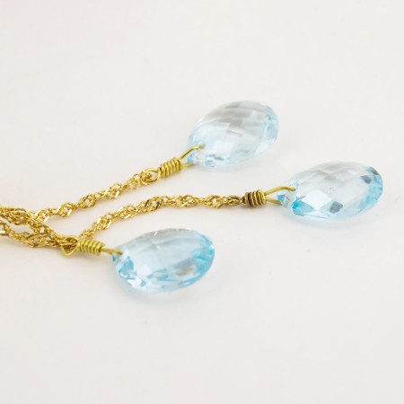 Pendientes de oro 18 kt. con topacios azules