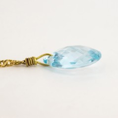 Pendientes de oro 18 kt. con topacios azules