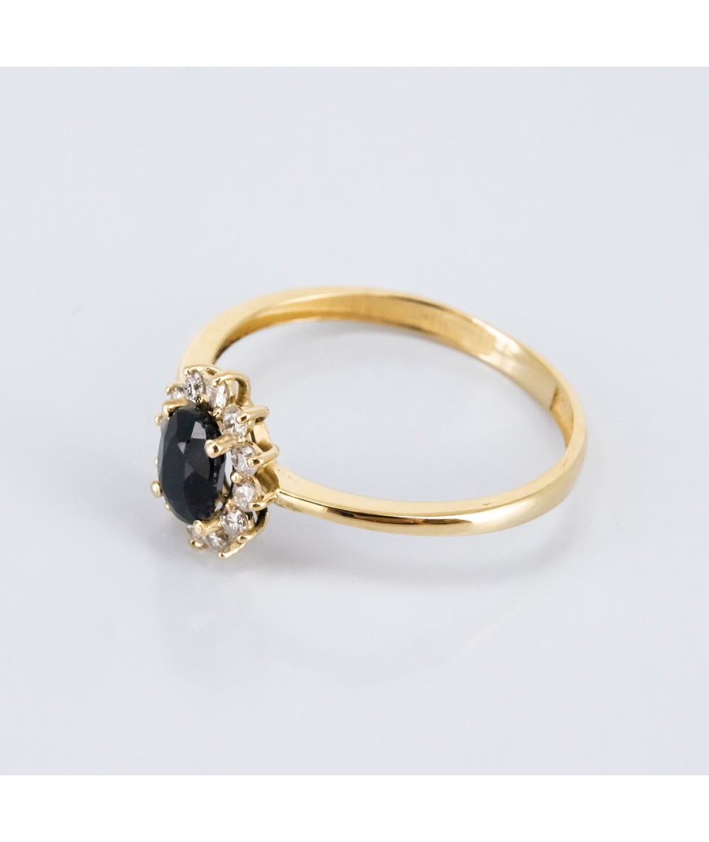 Anillo de Oro 14kt con Diamantes y Zafiro