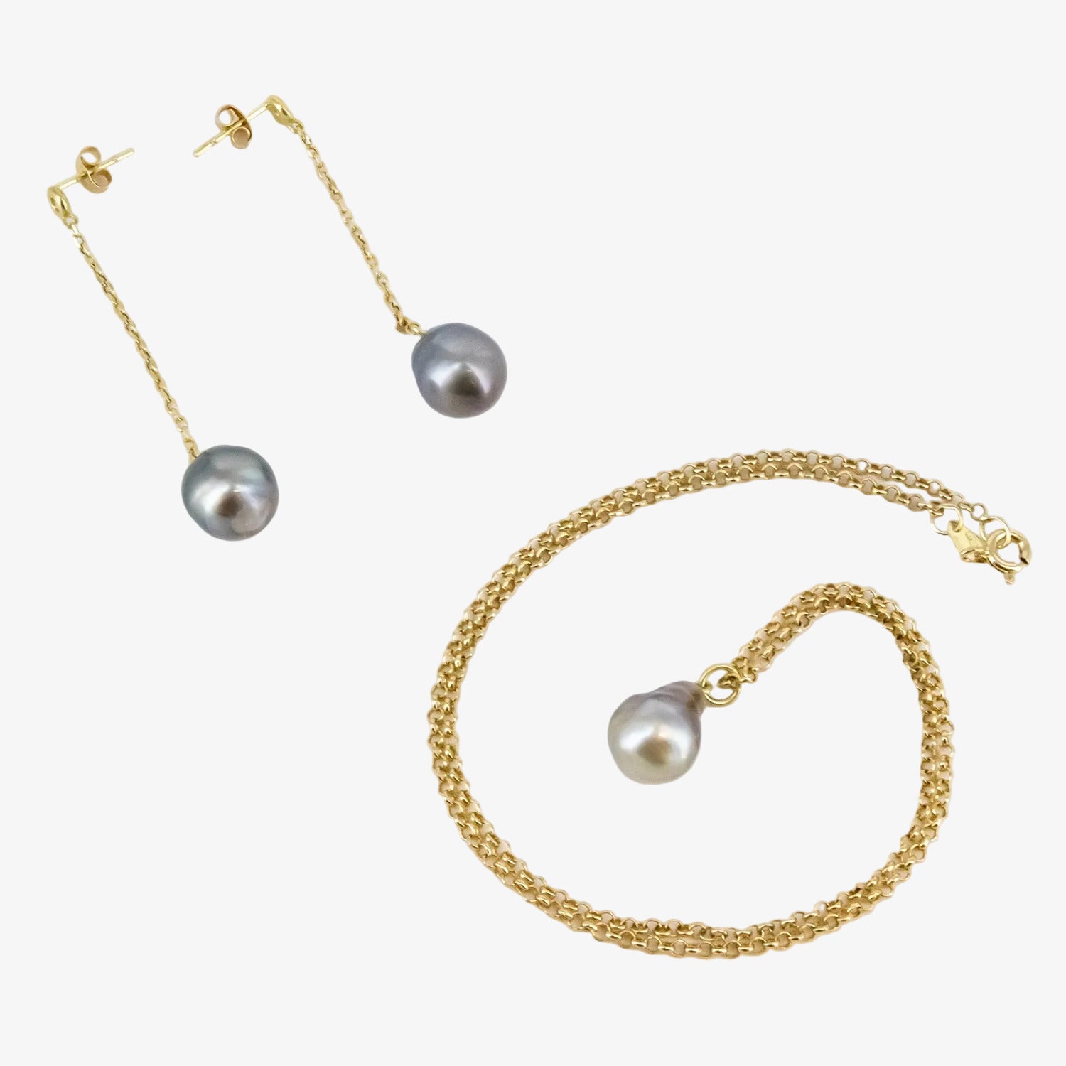 Conjunto de colgante y pendientes de oro de 18 kt. con diamantes y perlas de Tahití barrocas
