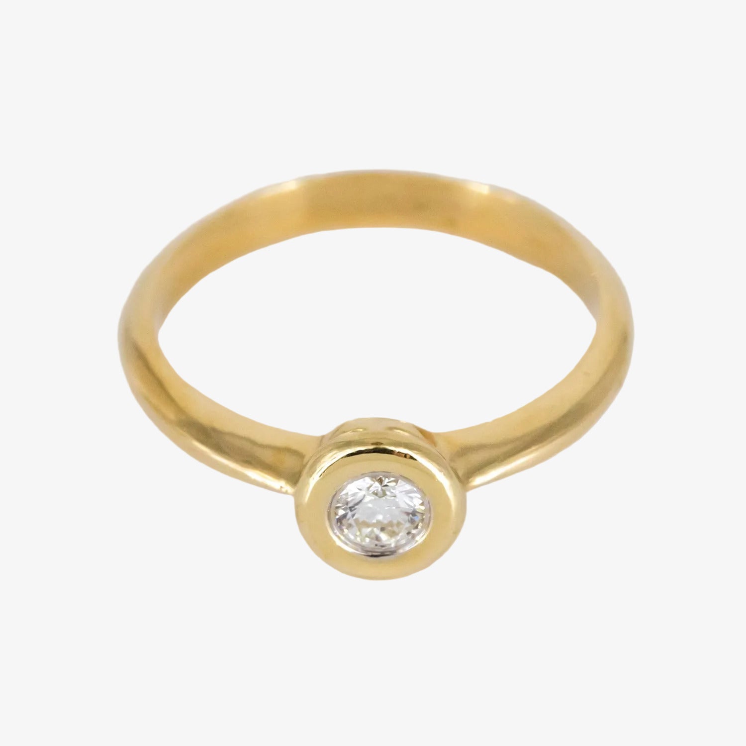 Solitario de oro 18 kt. con diamante talla brillante