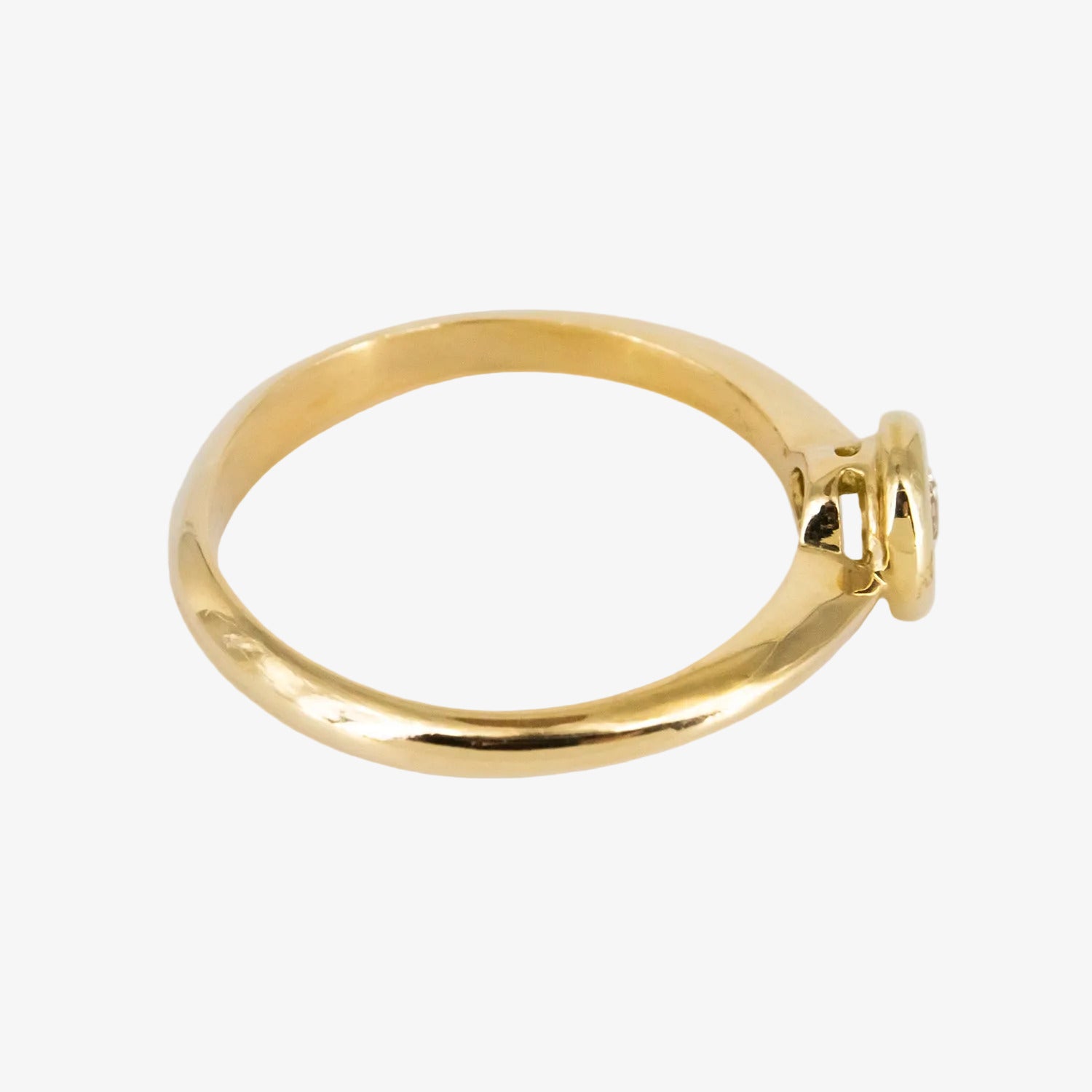 Solitario de oro 18 kt. con diamante talla brillante