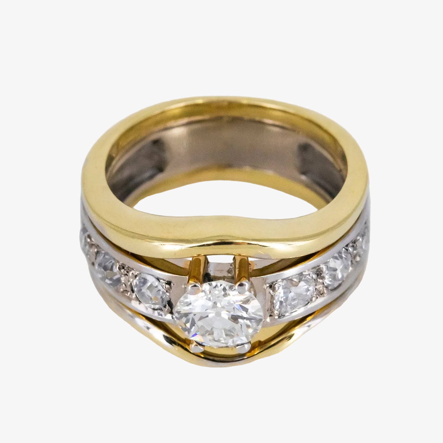 Sortija de oro bicolor de 18 kt. con diamantes talla brillante