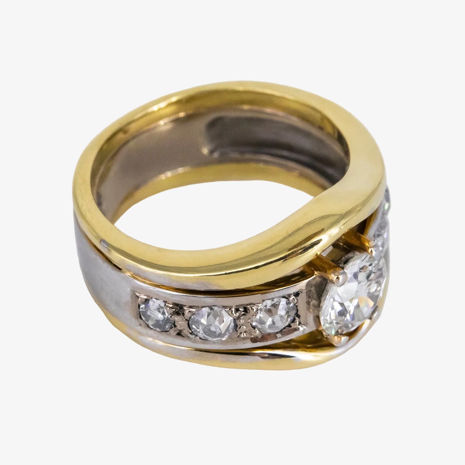 Sortija de oro bicolor de 18 kt. con diamantes talla brillante