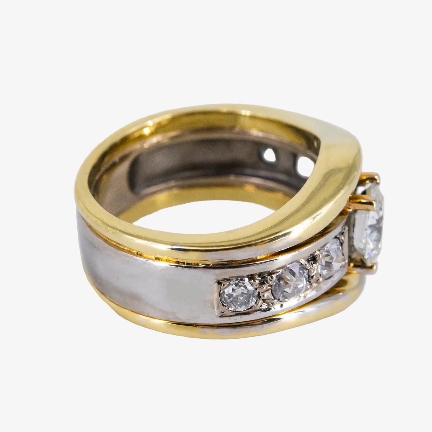 Sortija de oro bicolor de 18 kt. con diamantes talla brillante