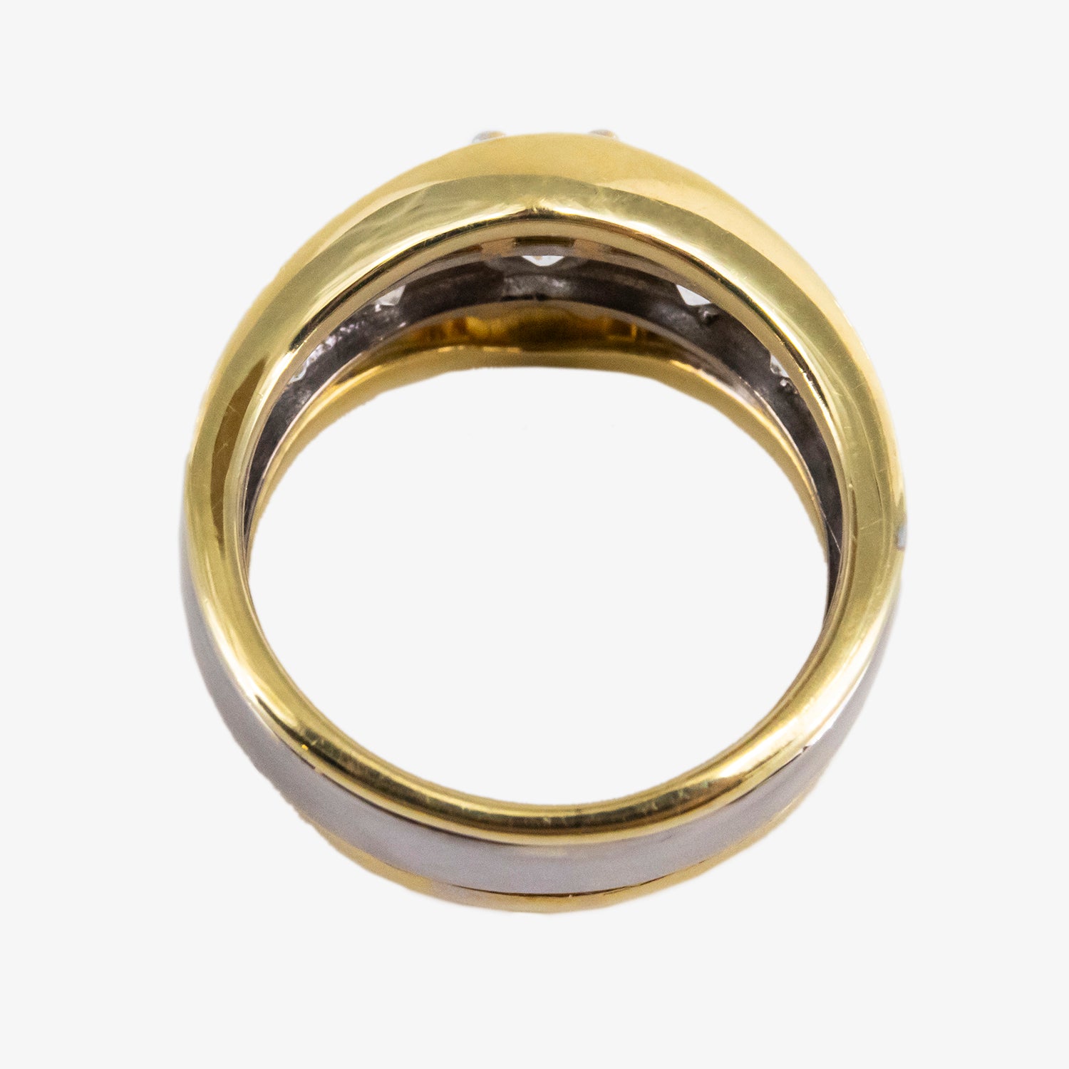 Sortija de oro bicolor de 18 kt. con diamantes talla brillante