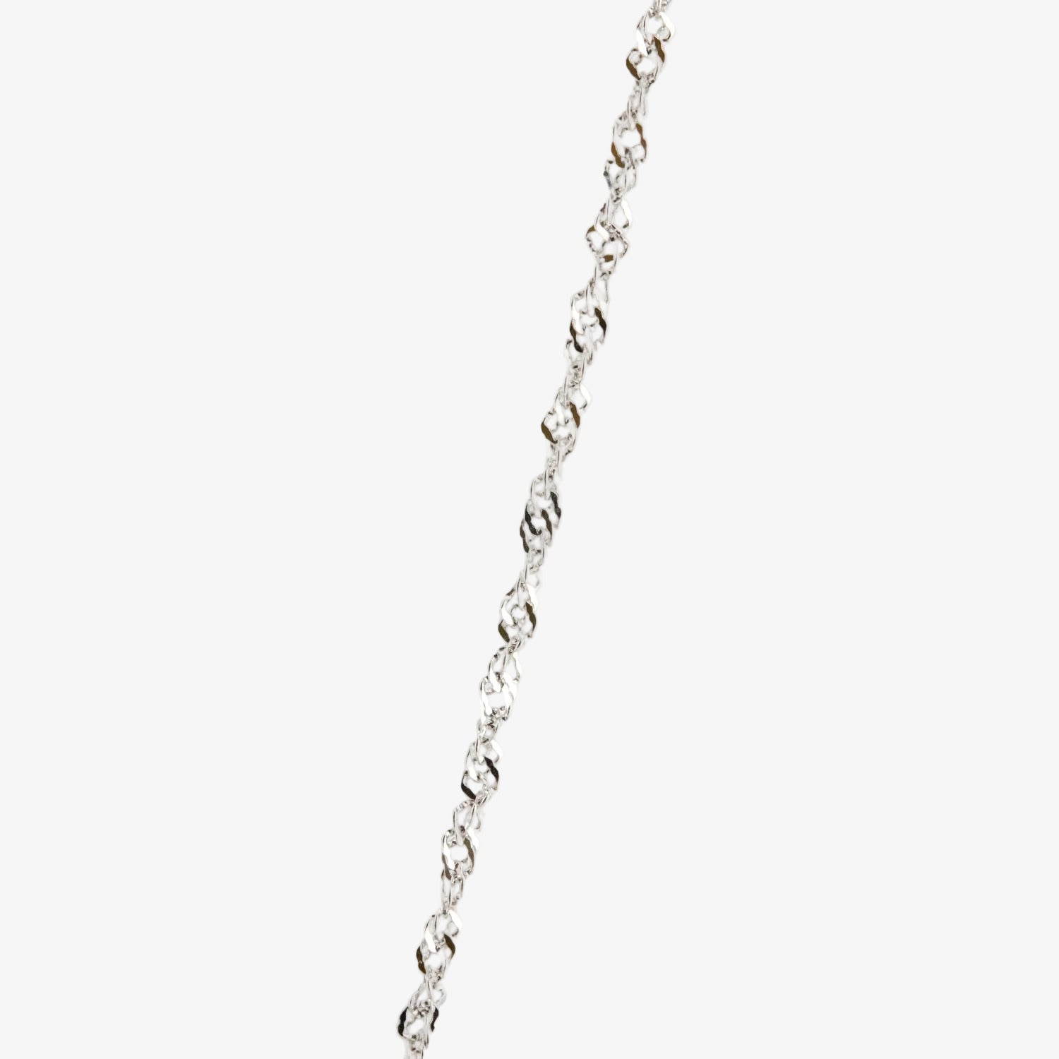 Colgante de oro blanco de 18 kt. con perla australiana de 12 mm. y diamante talla brillante