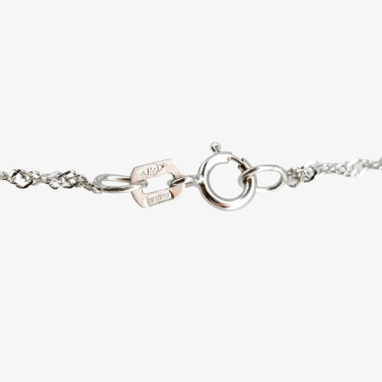 Colgante de oro blanco de 18 kt. con perla australiana de 12 mm. y diamante talla brillante