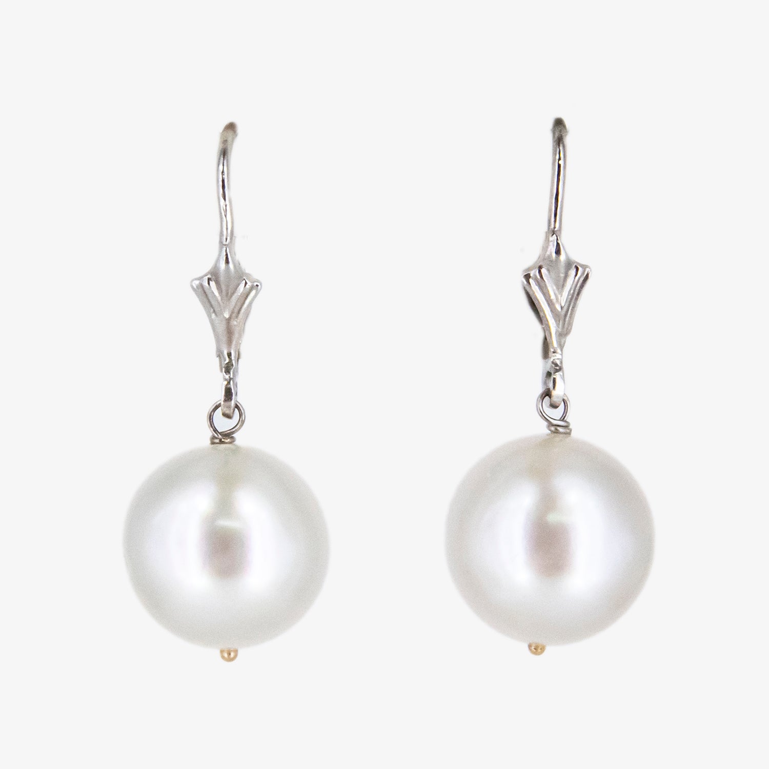 Pendientes de oro blanco 18 kt. con perlas australianas y cierre tipo ballestilla
