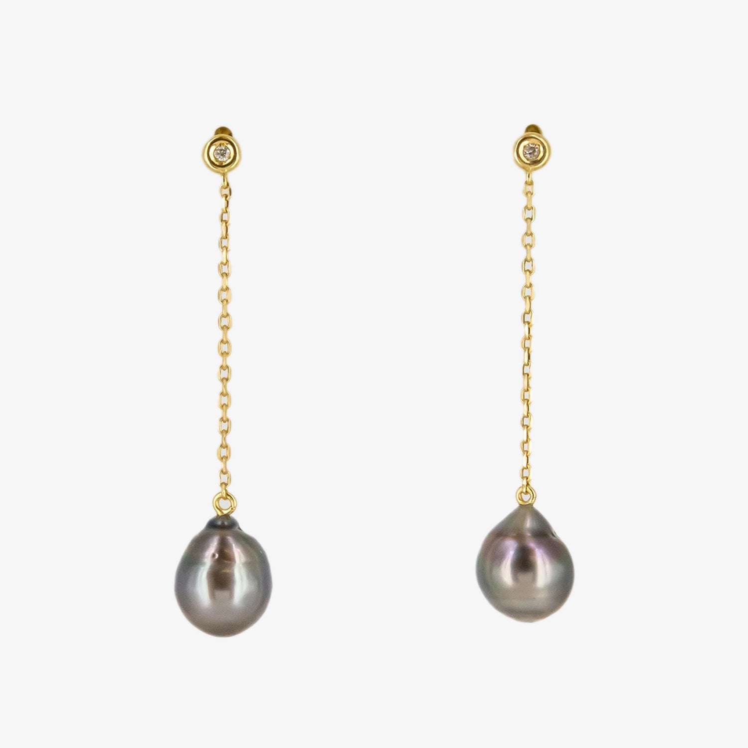 Set of 18 kt. gold pendant and earrings with diamonds and baroque Tahitian pearls