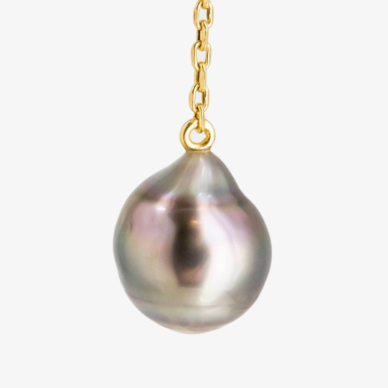 Set of 18 kt. gold pendant and earrings with diamonds and baroque Tahitian pearls