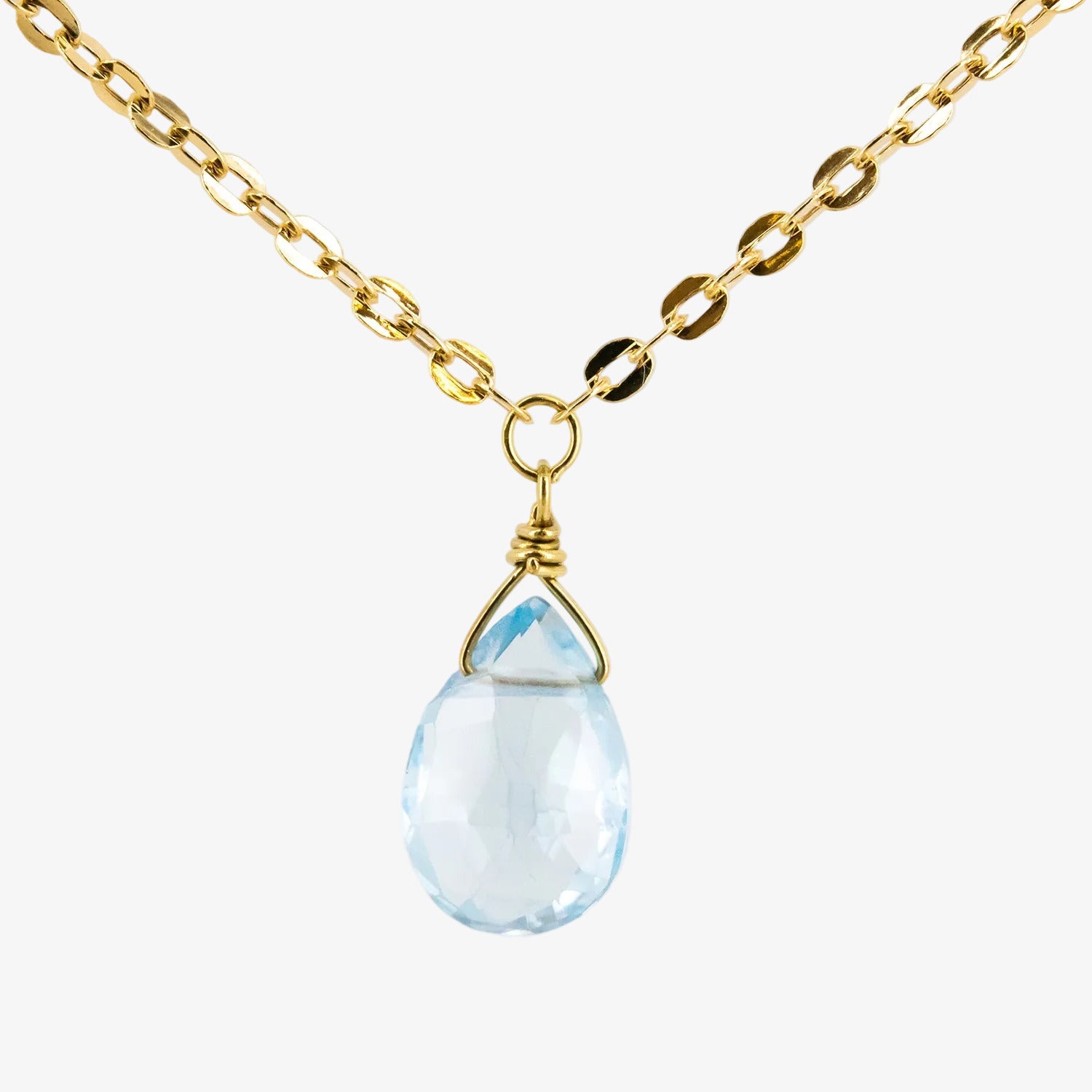 Gargantilla de oro 18 kt. con tres topacios azules