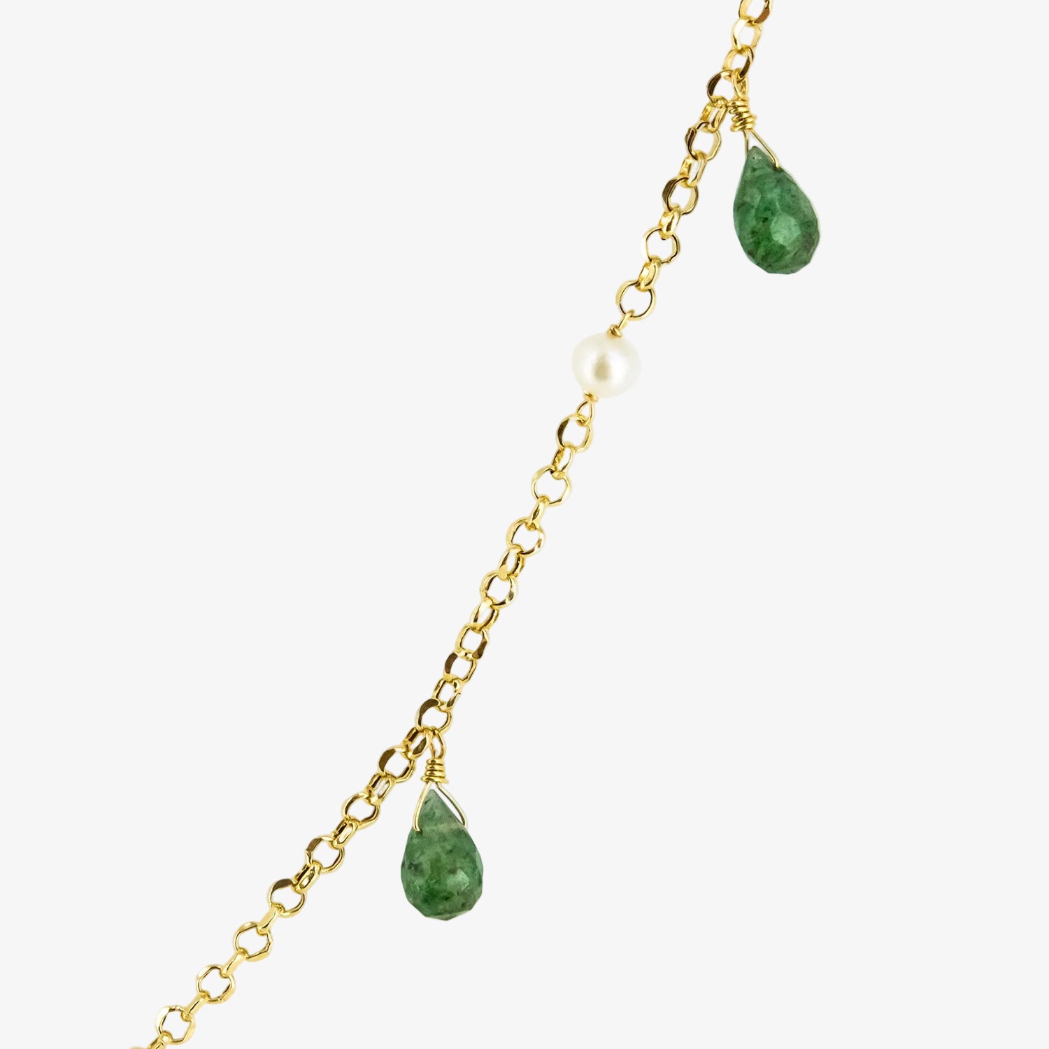 Gargantilla de oro amarillo de 18 kt. con peridoto, perlas y rubí