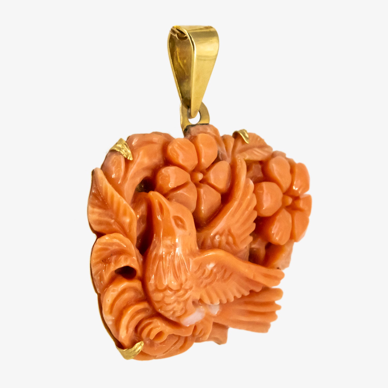Colgante vintage de coral natural tallado a mano y oro de 18 kt.