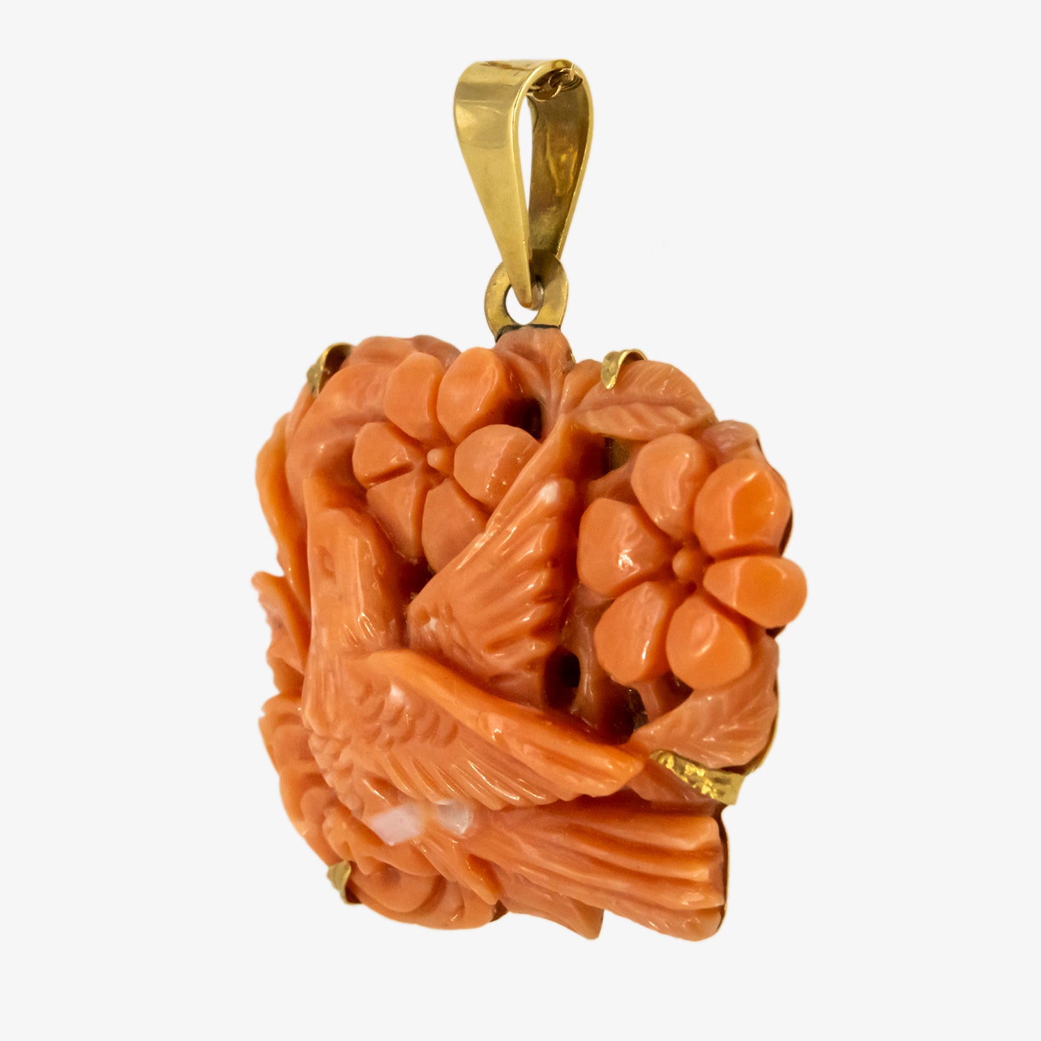 Colgante vintage de coral natural tallado a mano y oro de 18 kt.