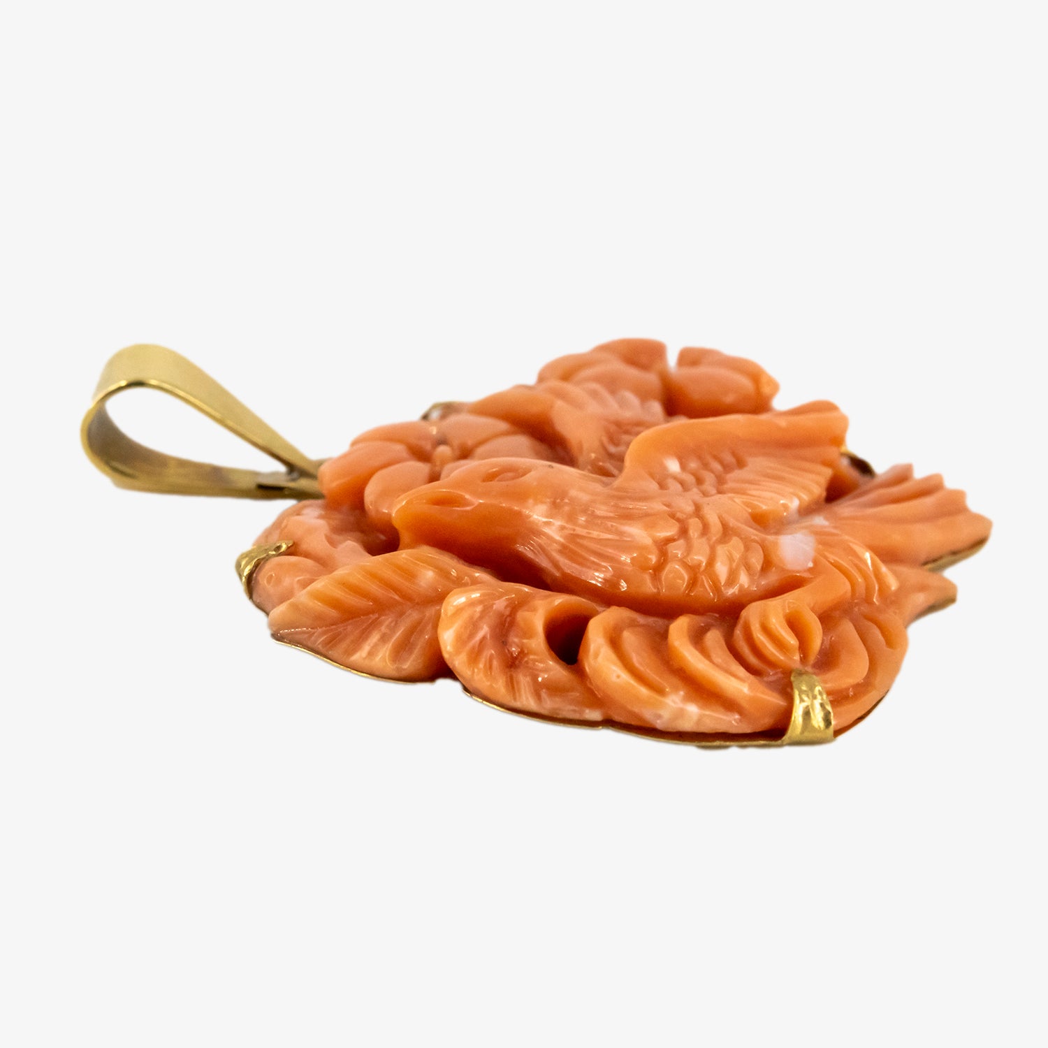 Colgante vintage de coral natural tallado a mano y oro de 18 kt.