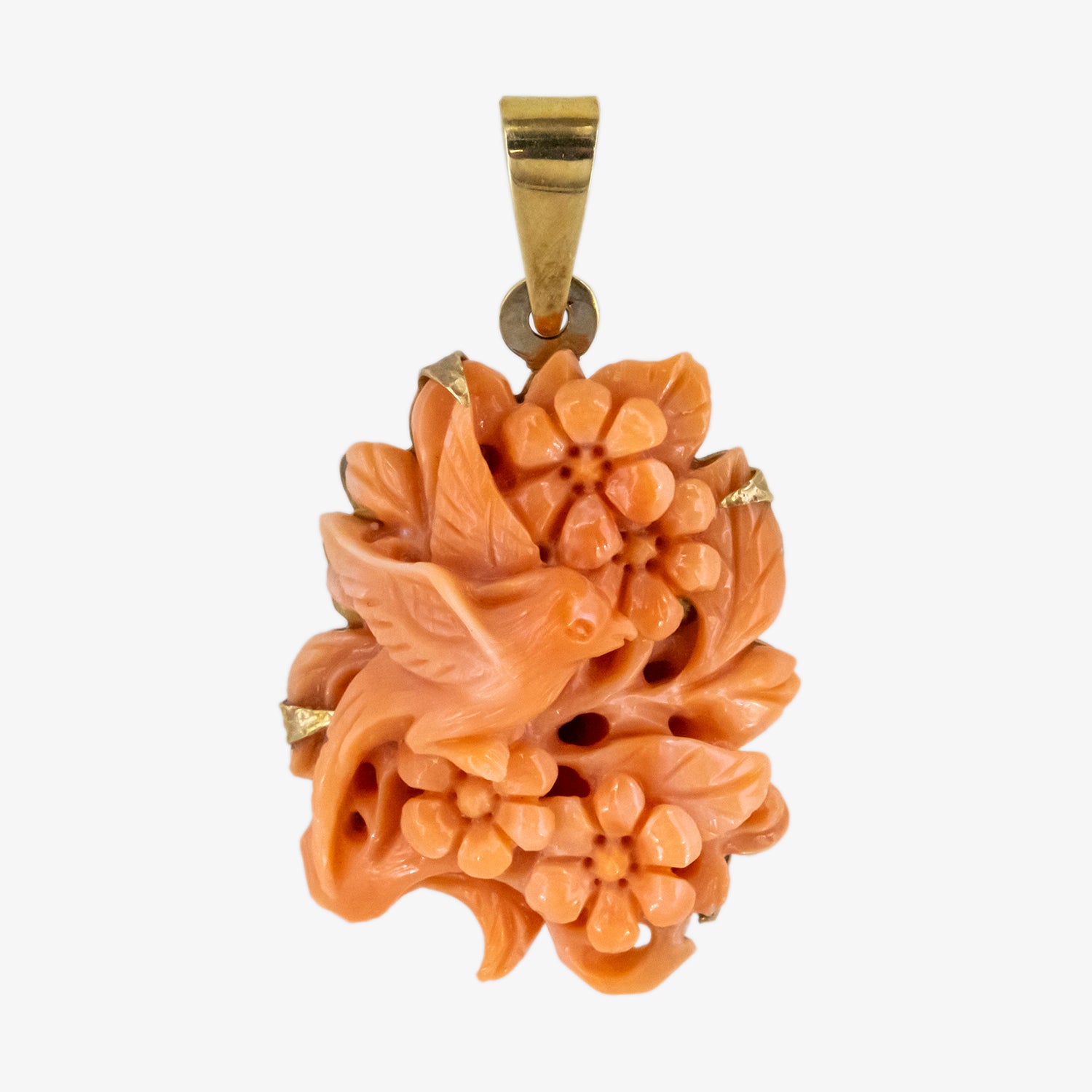 Colgante vintage de coral natural tallado a mano y oro de 18 kt.