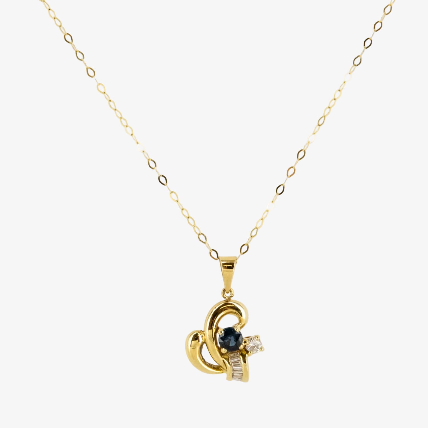 Colgante de oro 18 kt. con diamantes y zafiro