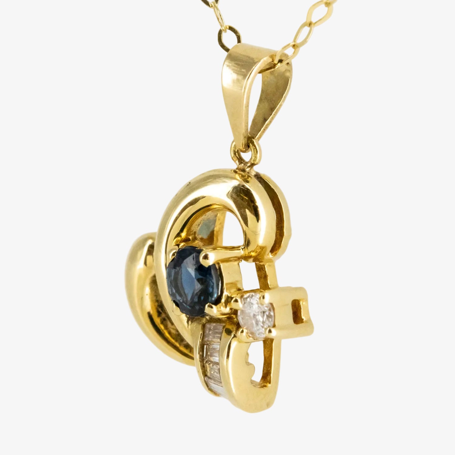 Colgante de oro 18 kt. con diamantes y zafiro