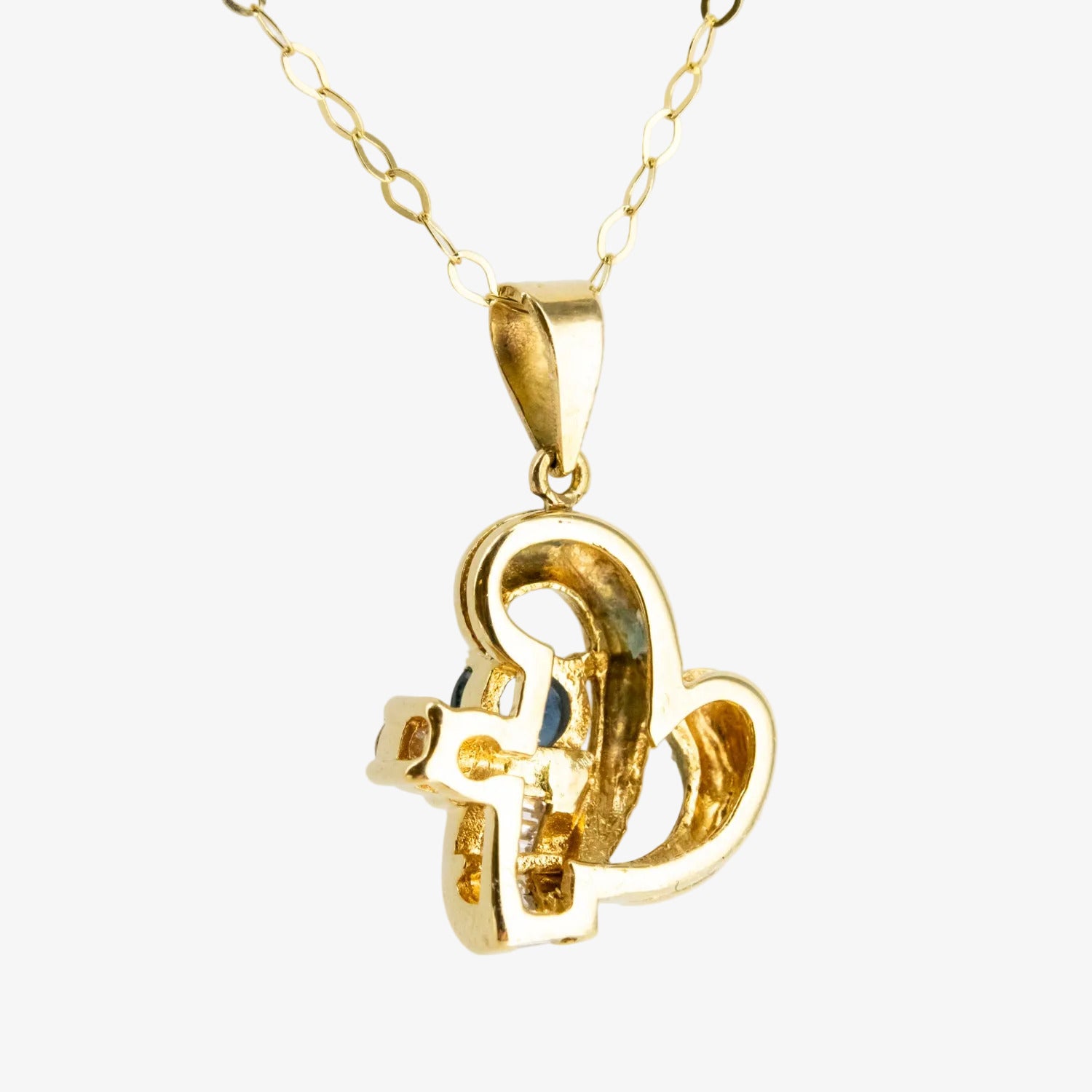 Colgante de oro 18 kt. con diamantes y zafiro