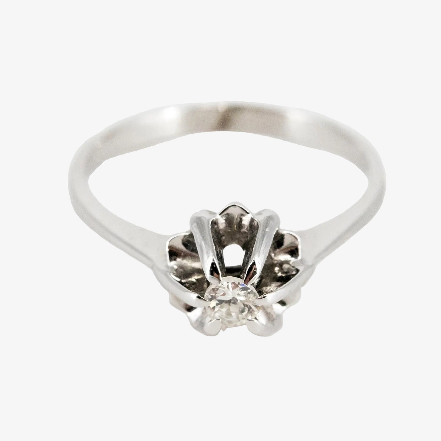Solitario de oro blanco 18 kt. con diamante talla brillante