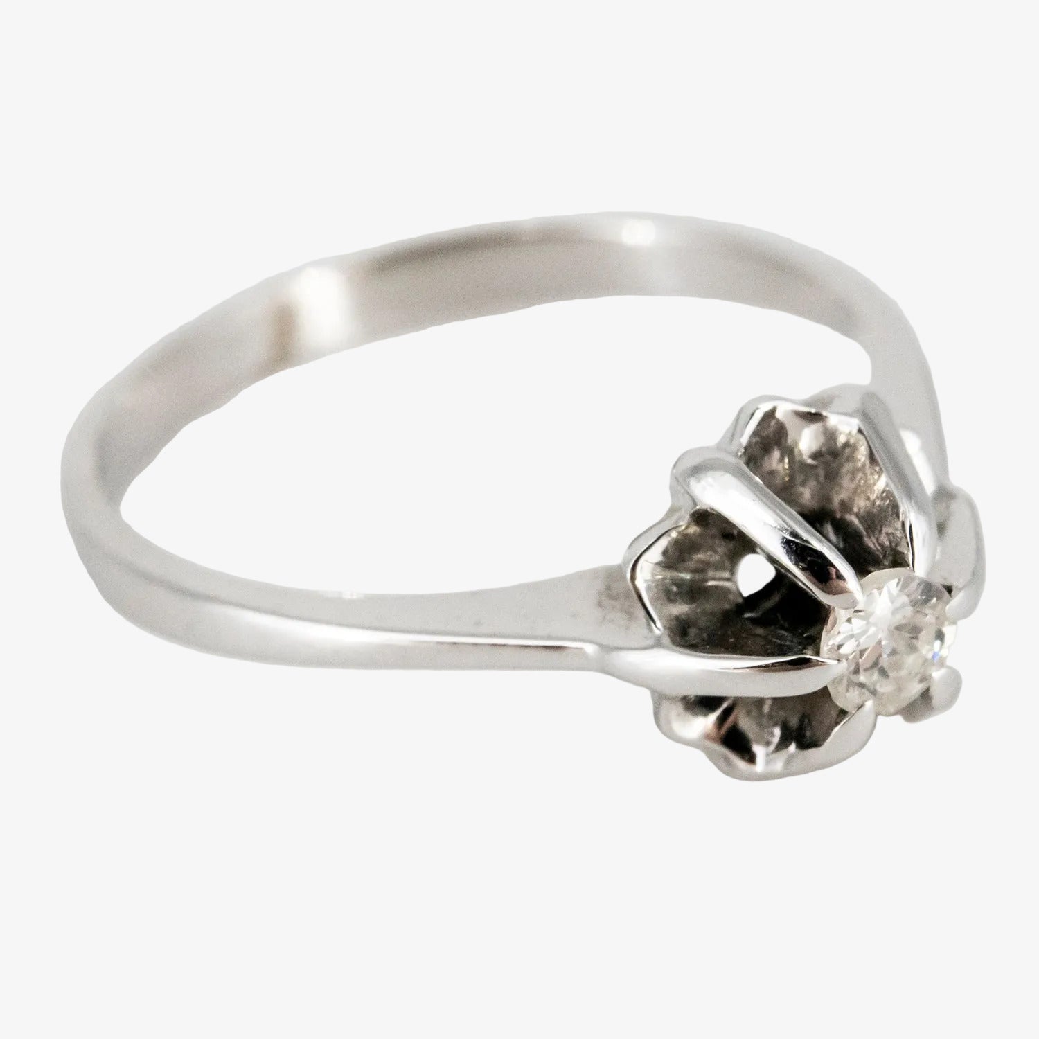 Solitario de oro blanco 18 kt. con diamante talla brillante