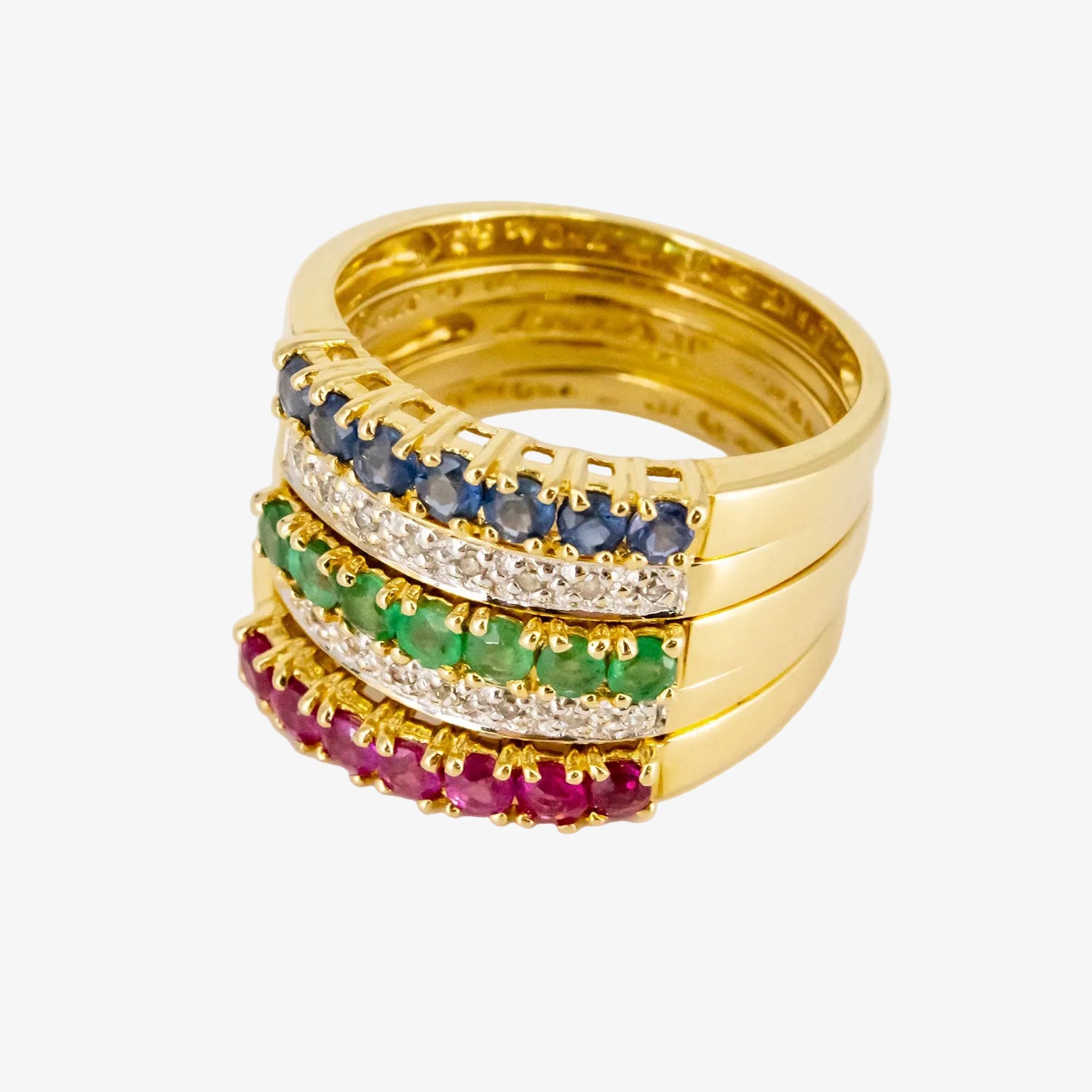 Sortijas combinables de oro 18 kt. con diamantes, rubíes, zafiros y esmeraldas