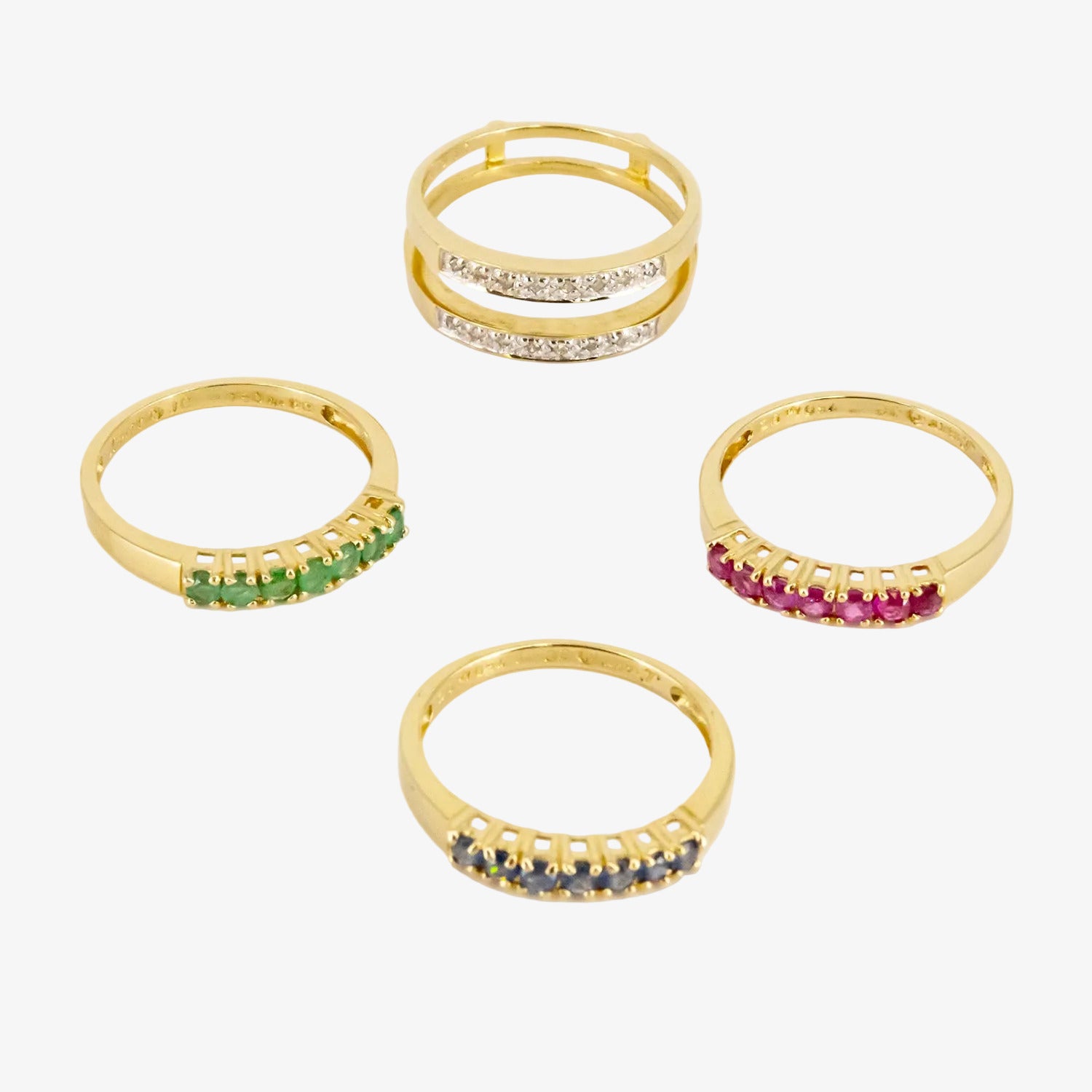 Sortijas combinables de oro 18 kt. con diamantes, rubíes, zafiros y esmeraldas