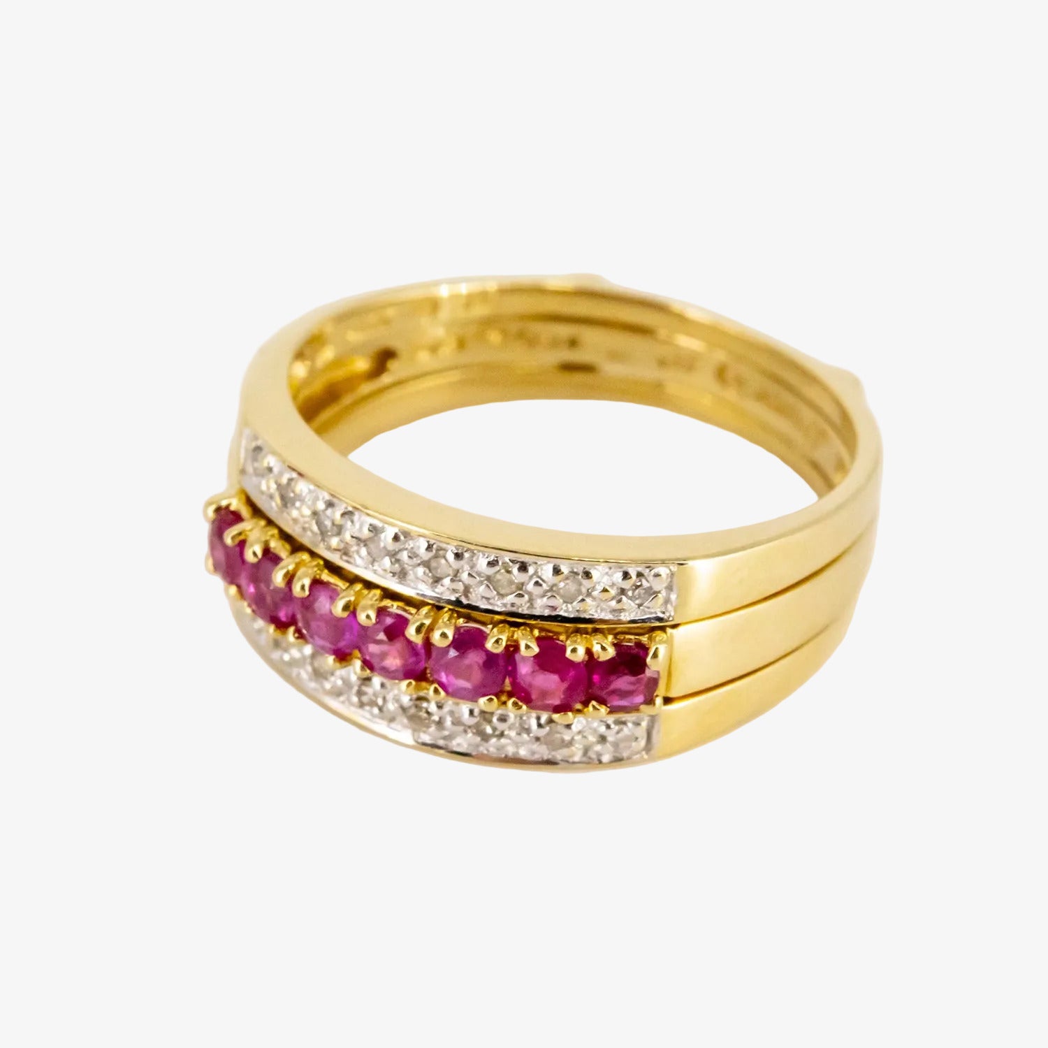 Sortijas combinables de oro 18 kt. con diamantes, rubíes, zafiros y esmeraldas