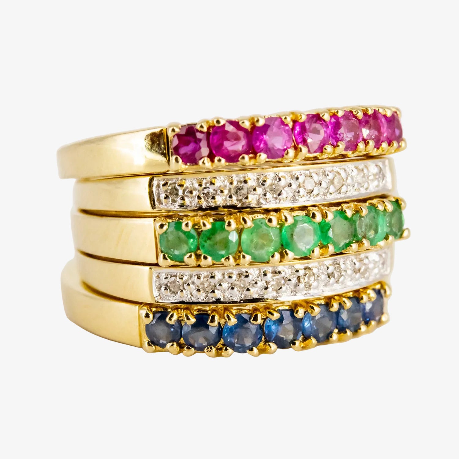 Sortijas combinables de oro 18 kt. con diamantes, rubíes, zafiros y esmeraldas