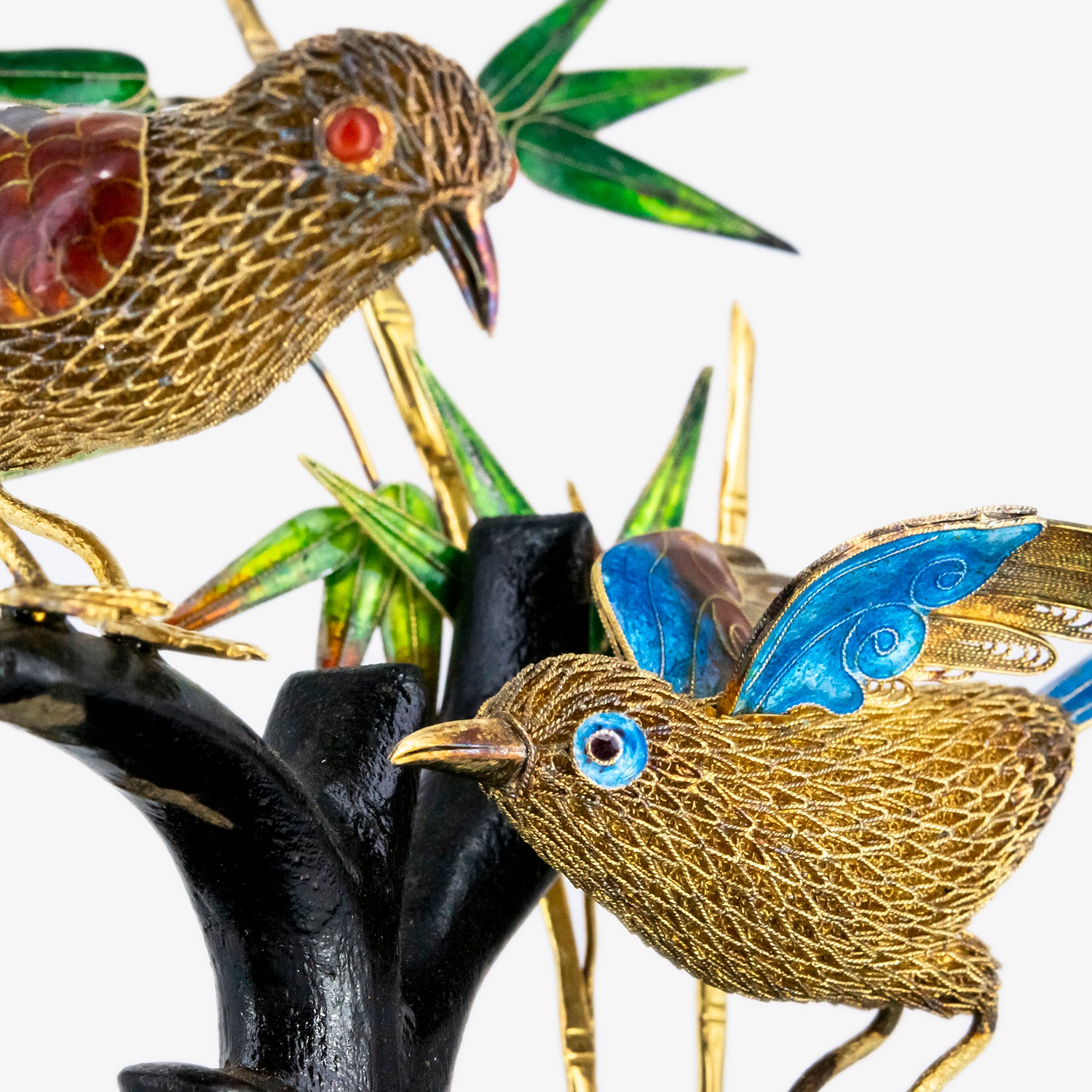 Figura decorativa con representación oriental de dos pájaros sobre bambú