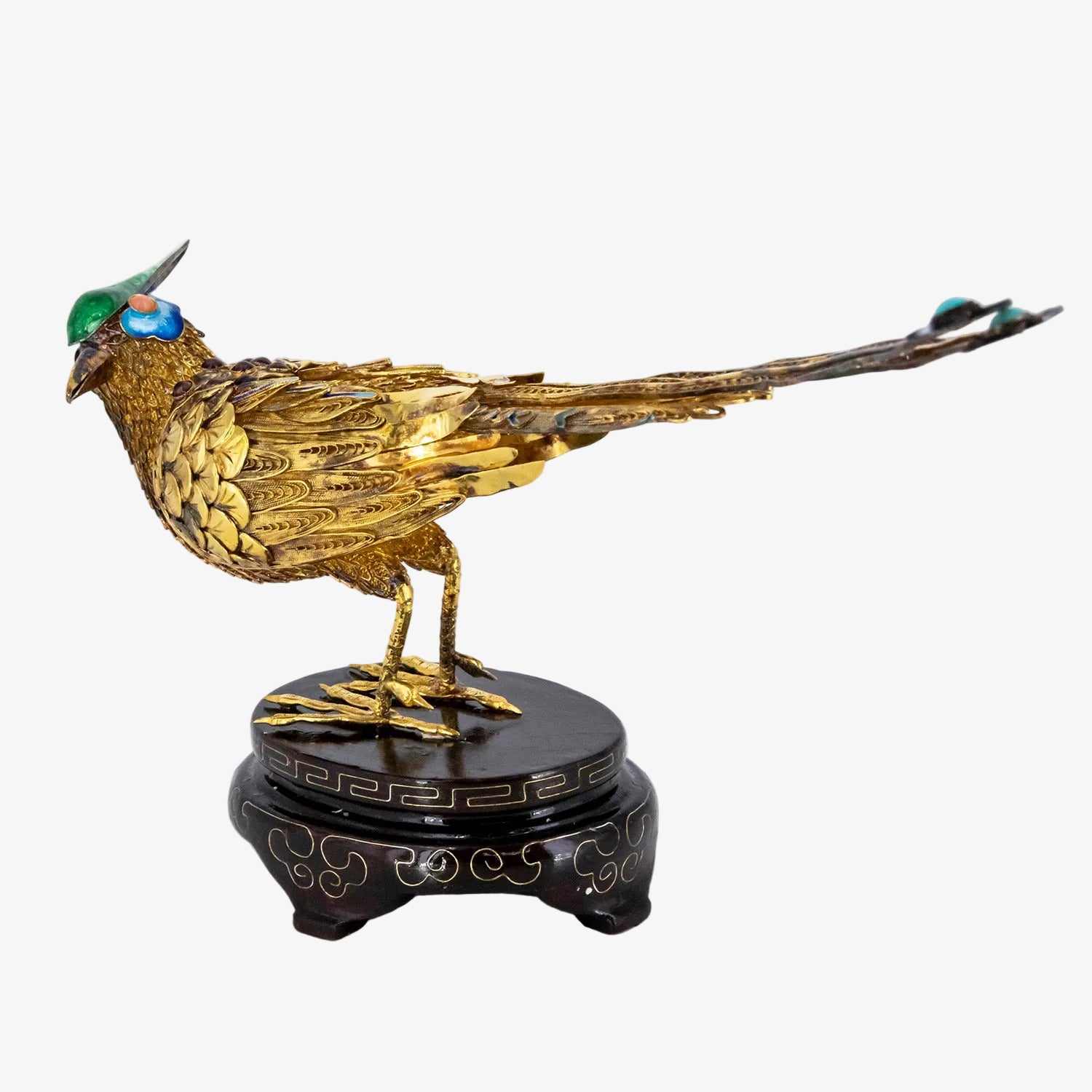 Figura decorativa con representación oriental de un ave fénix