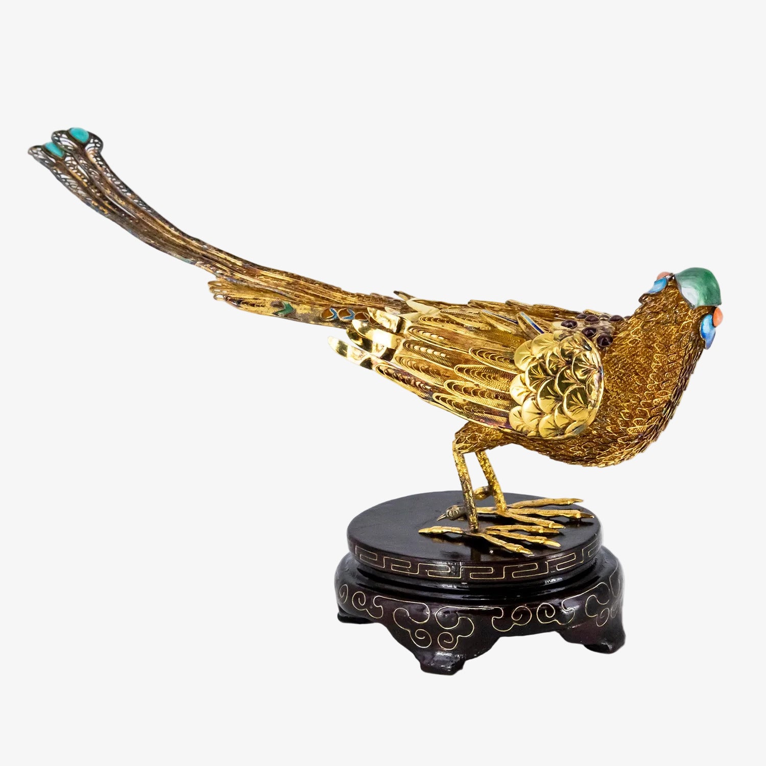 Figura decorativa con representación oriental de un ave fénix