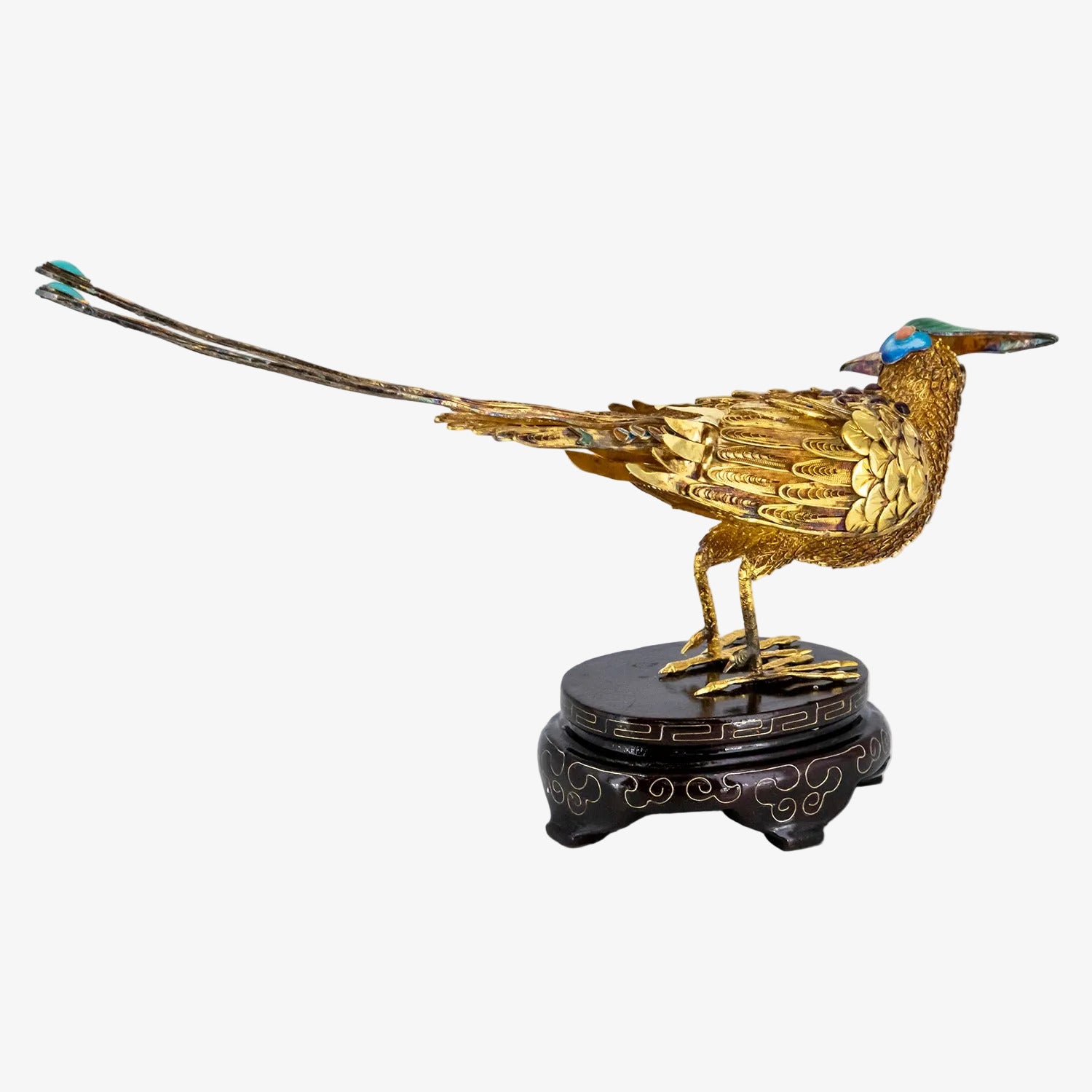 Figura decorativa con representación oriental de un ave fénix