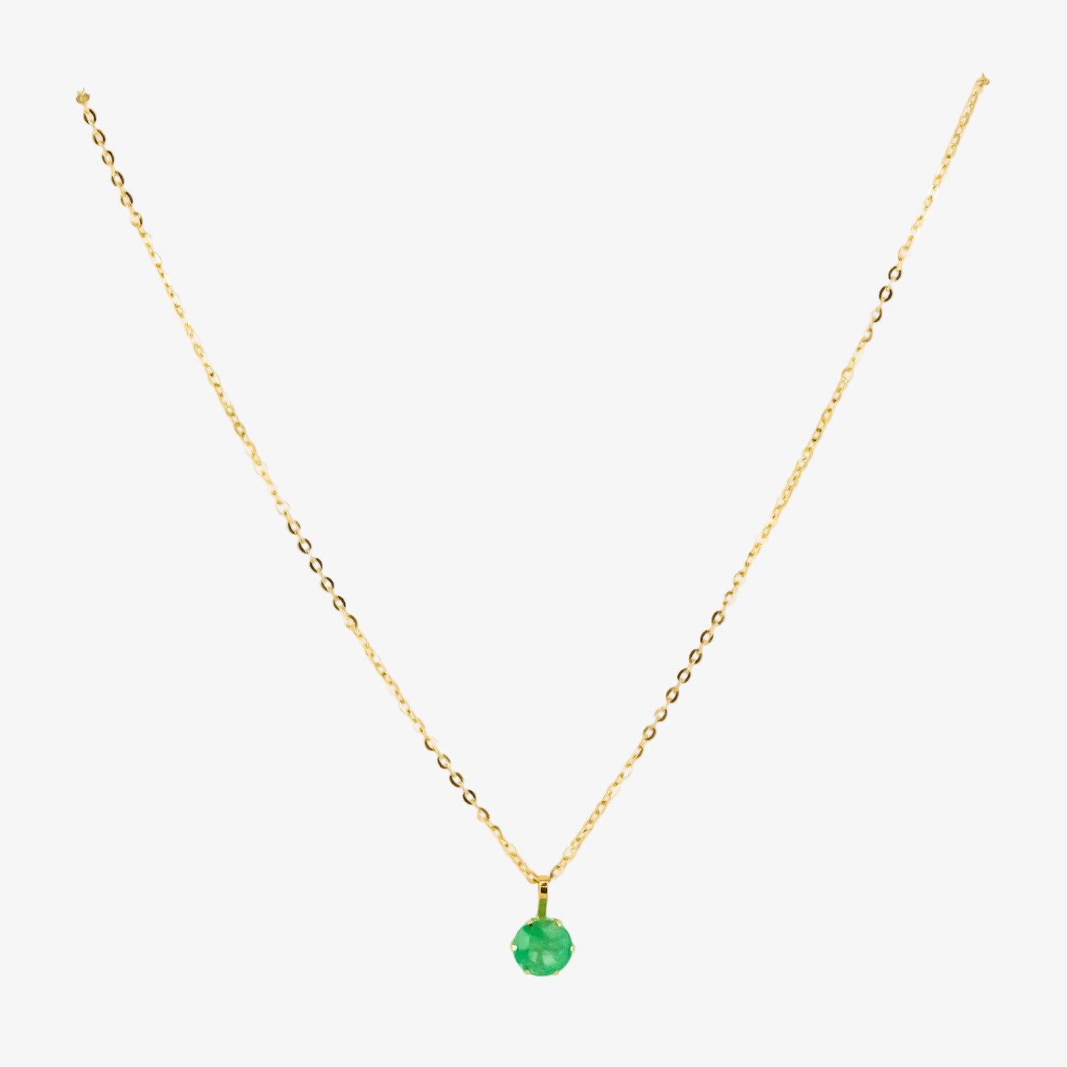 Colgante de oro 18 kt. con esmeralda de 0.60 ct.