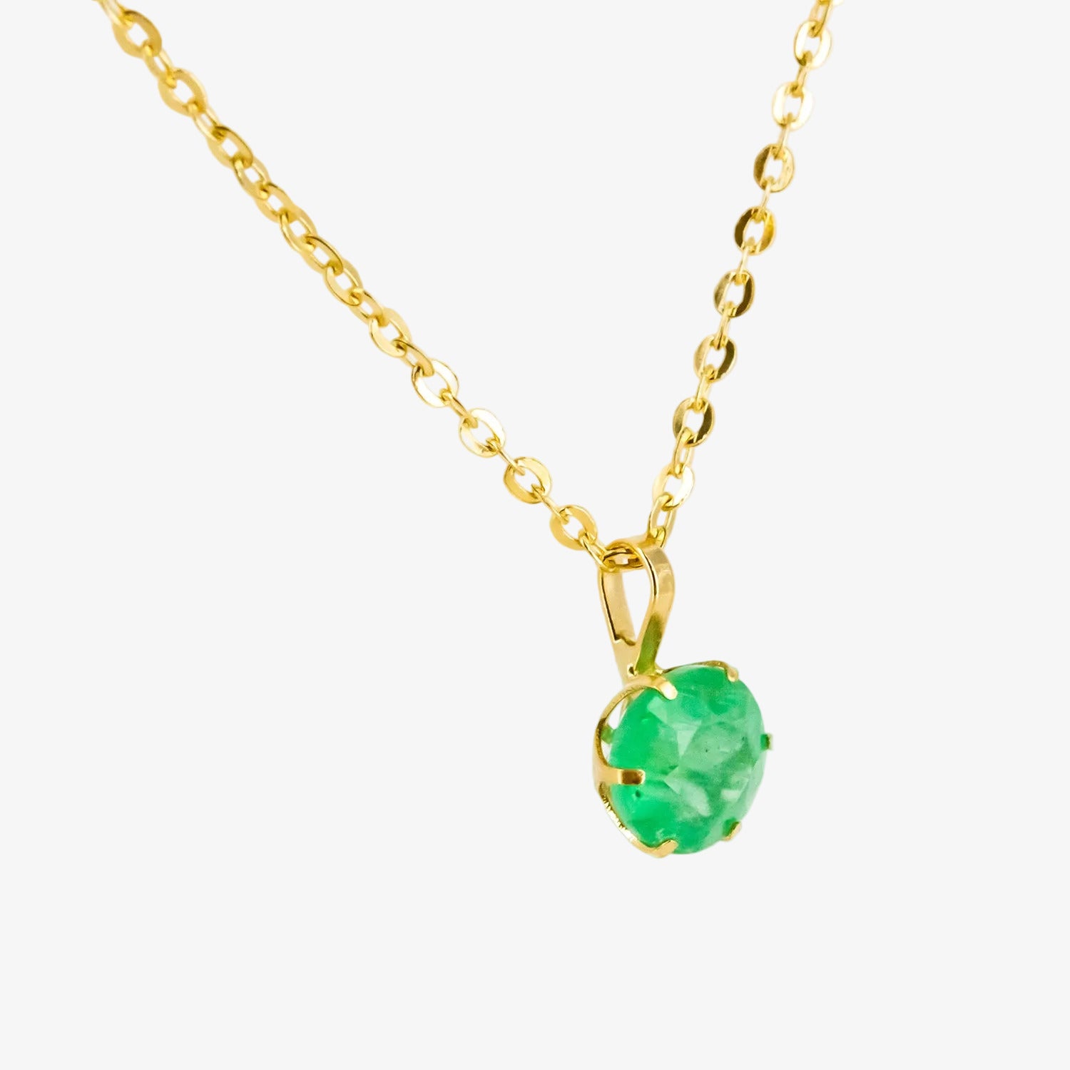 Colgante de oro 18 kt. con esmeralda de 0.60 ct.