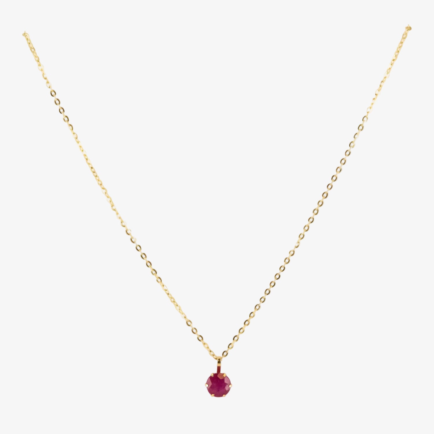 Colgante de oro 18 kt. con rubí de 0.60 ct.