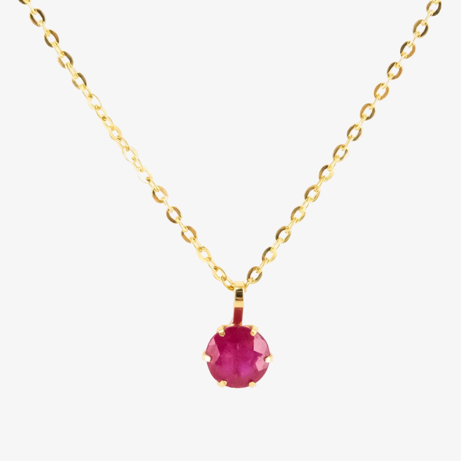 Colgante de oro 18 kt. con rubí de 0.60 ct.