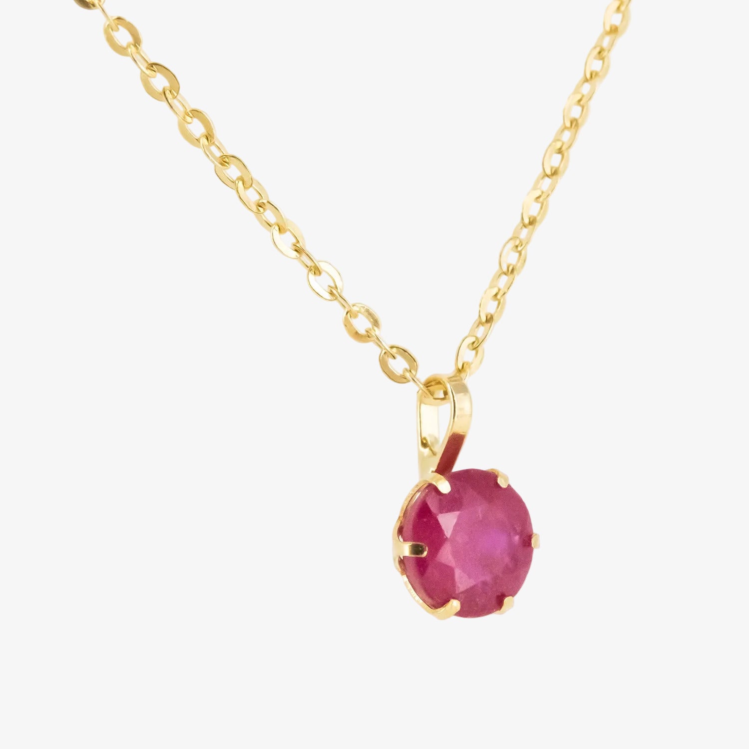 Colgante de oro 18 kt. con rubí de 0.60 ct.