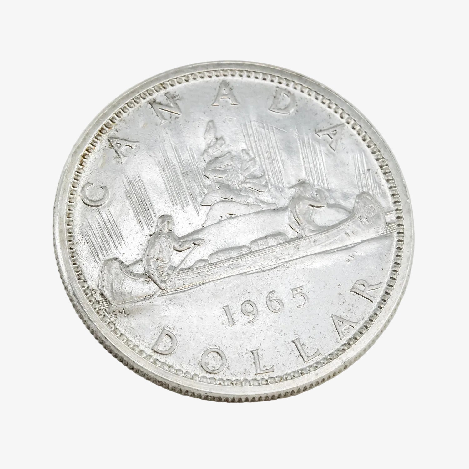 Moneda de un dólar canadiense de plata, año 1965