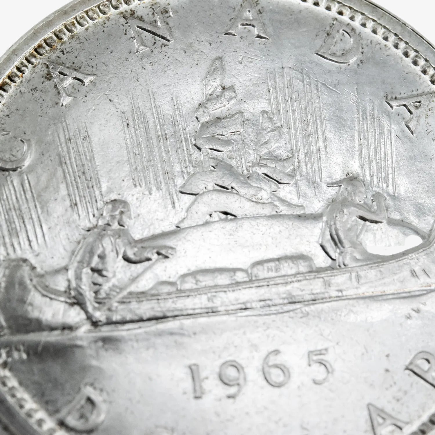 Moneda de un dólar canadiense de plata, año 1965