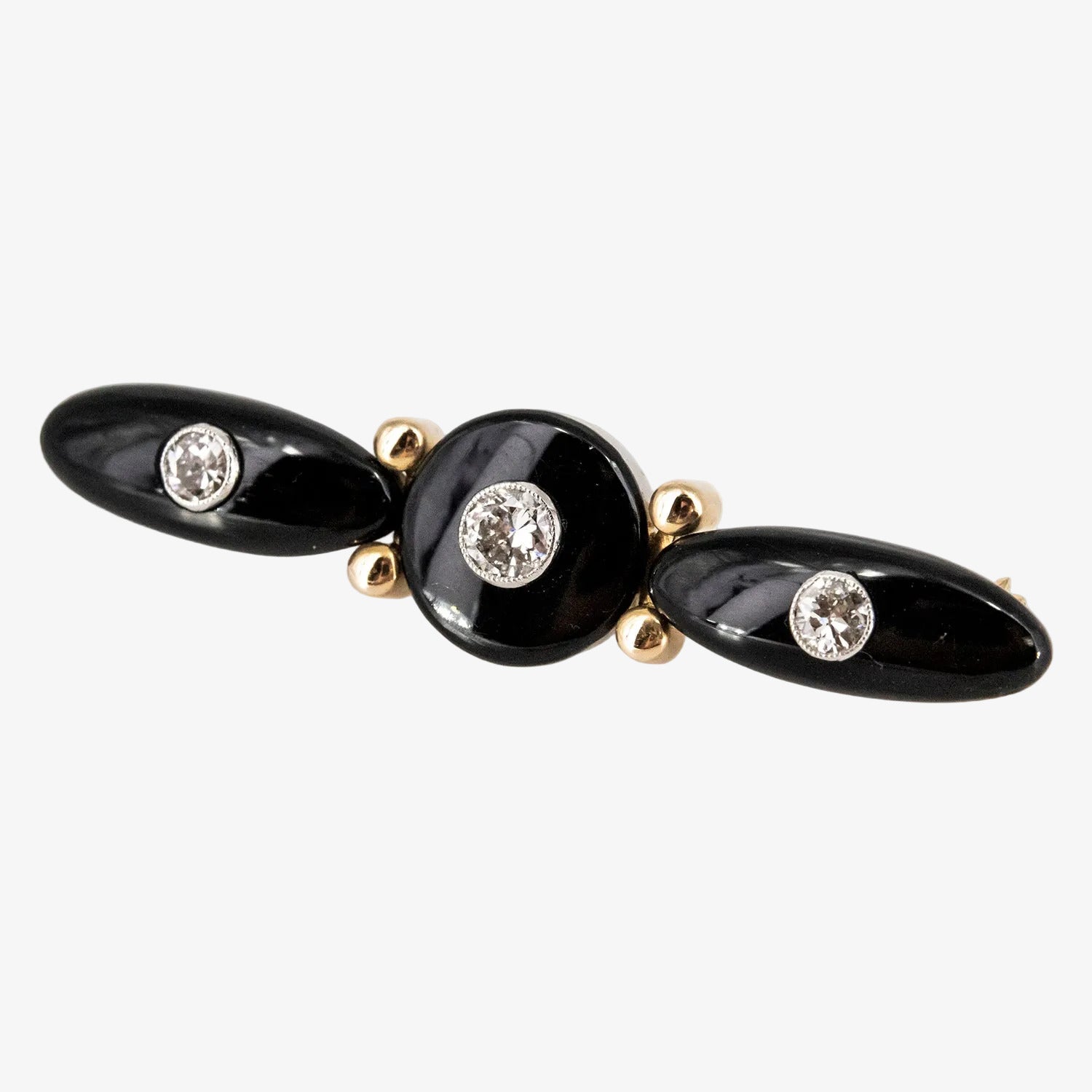 Broche vintage de oro bicolor 18 kt. con ónix y diamantes