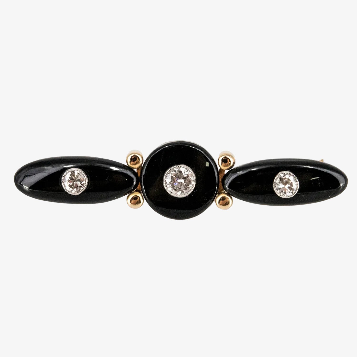 Broche vintage de oro bicolor 18 kt. con ónix y diamantes