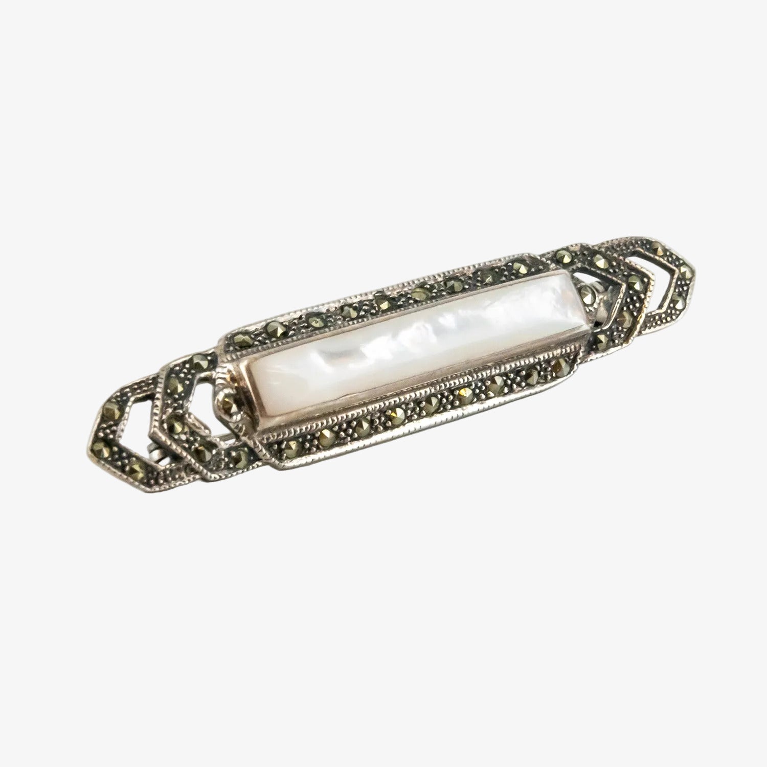 Broche vintage de plata con marcasitas y nácar