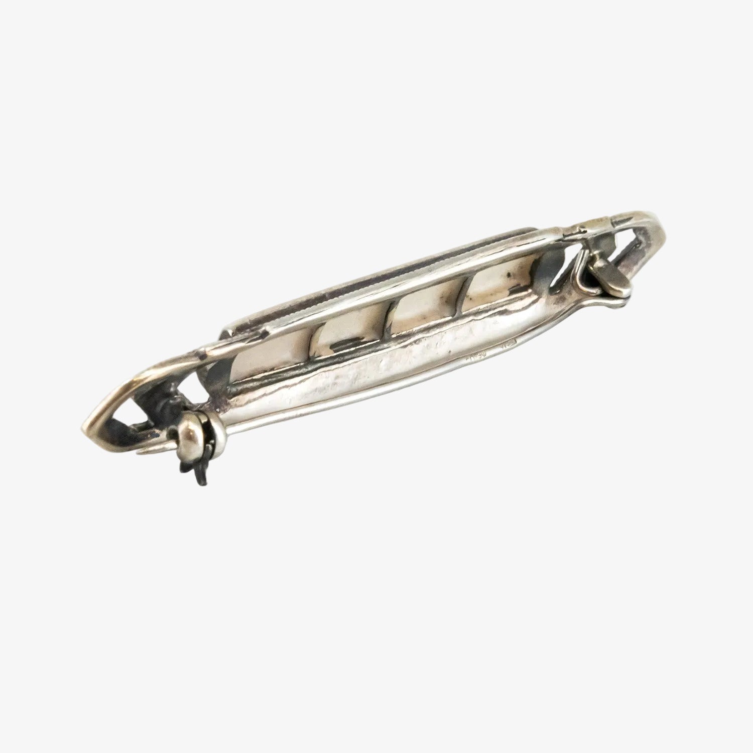 Broche vintage de plata con marcasitas y nácar