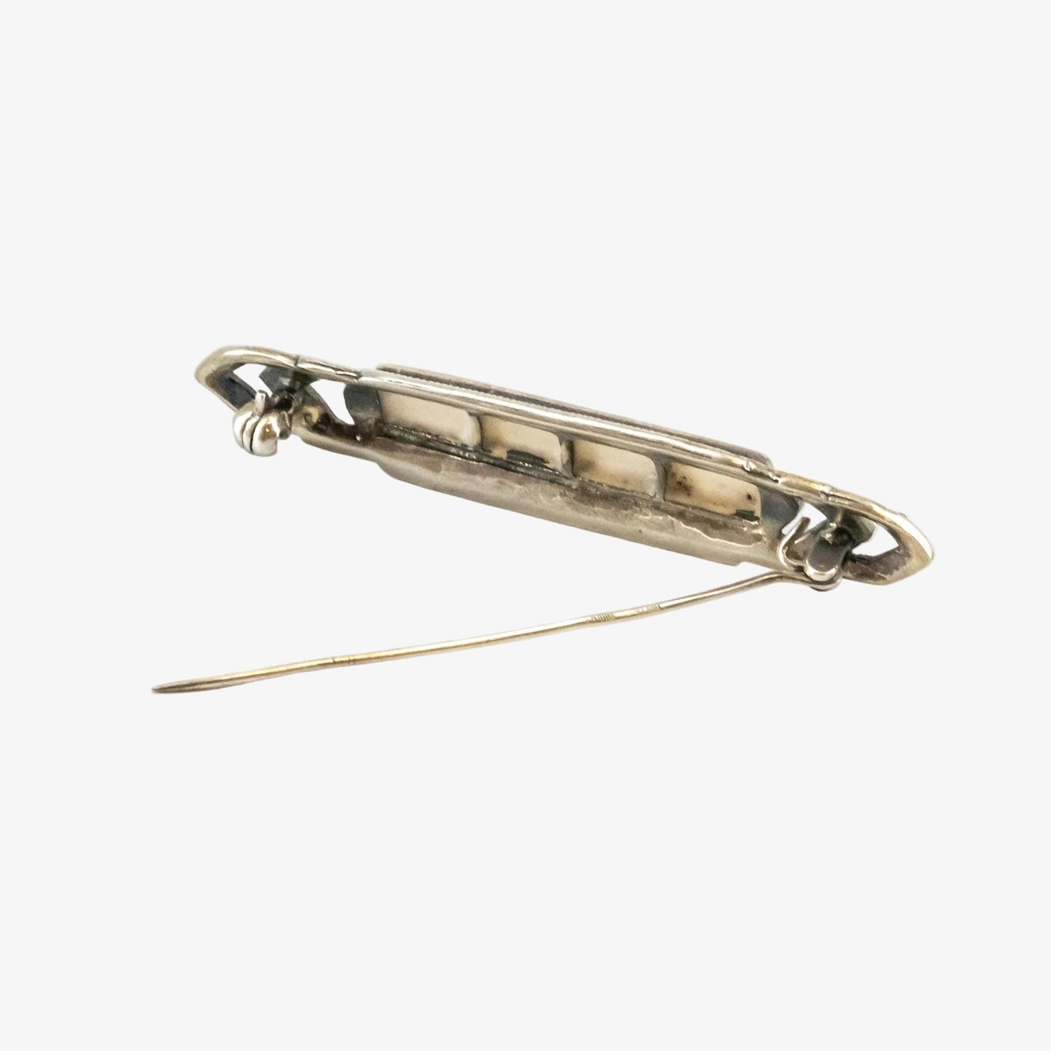 Broche vintage de plata con marcasitas y nácar
