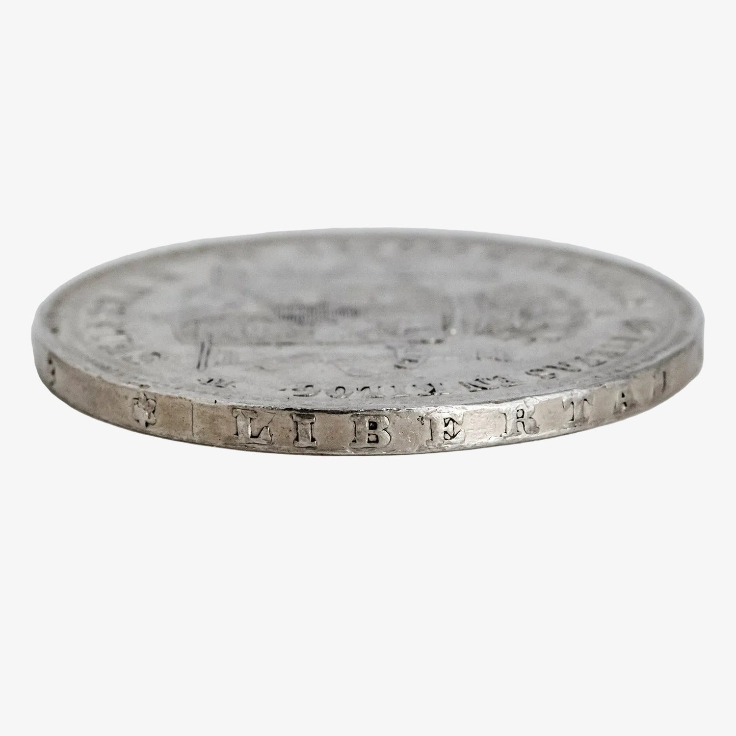Moneda de plata de cinco pesetas de Alfonso XII, año 1876