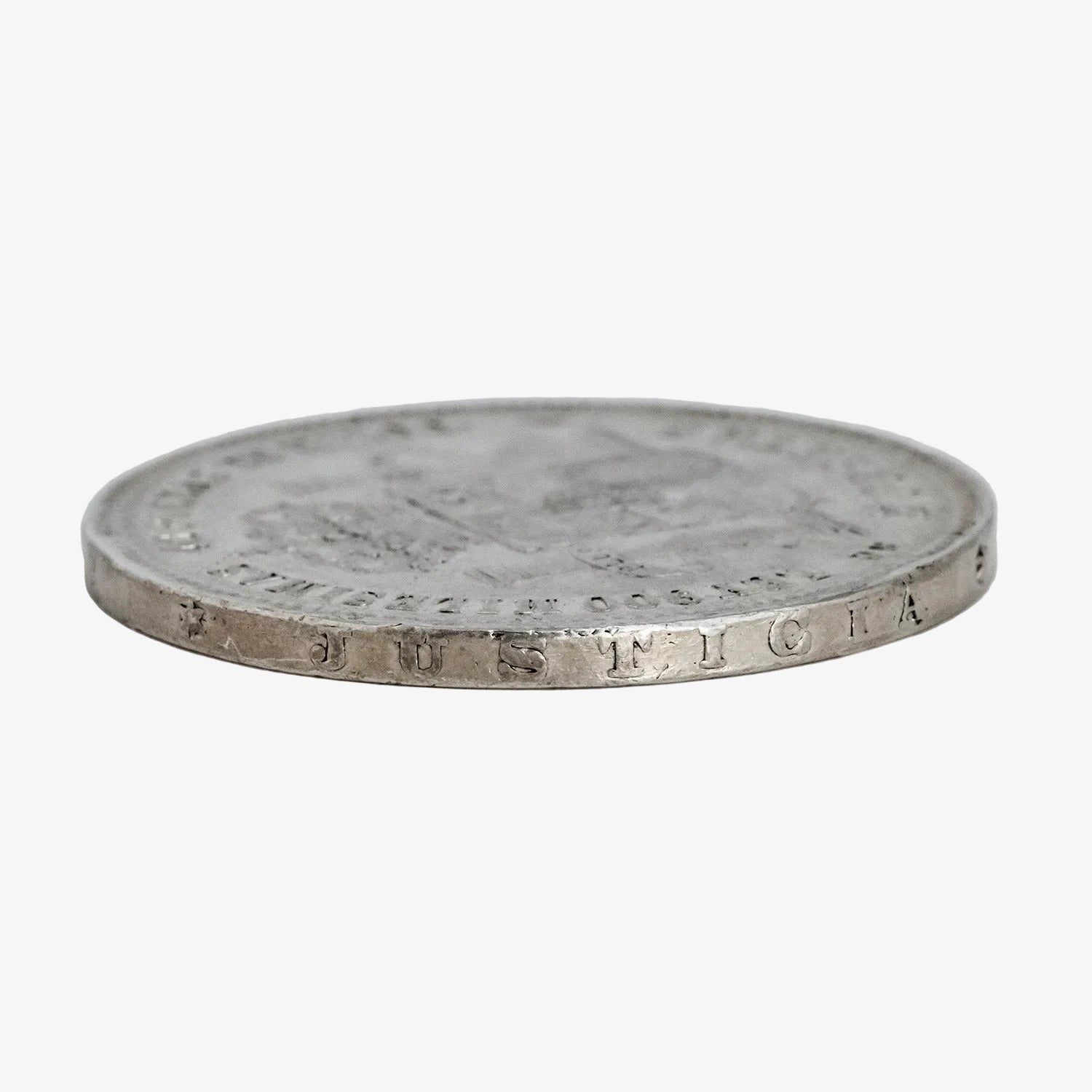 Moneda de plata de cinco pesetas de Alfonso XII, año 1876