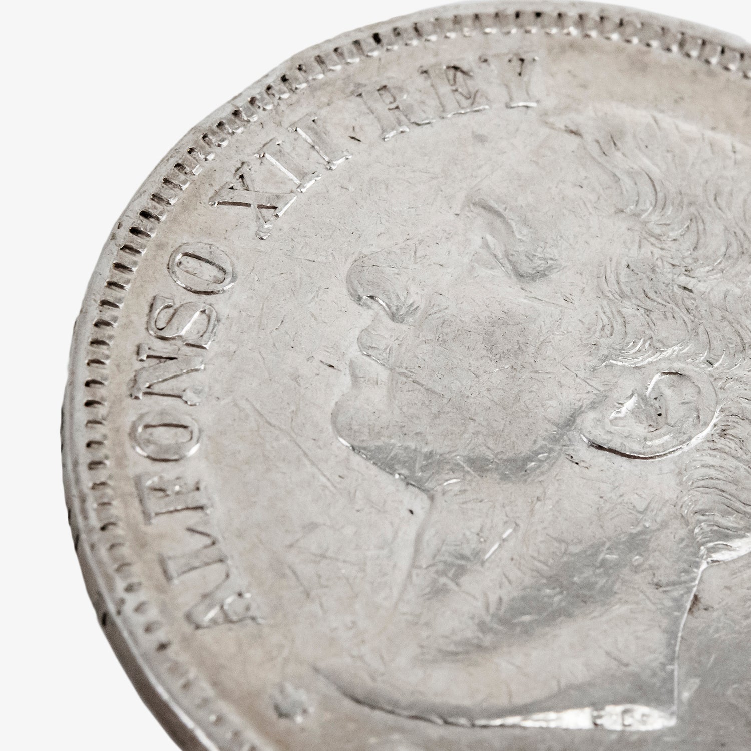 Moneda de plata de cinco pesetas de Alfonso XII, año 1876
